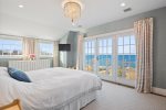 The primary bedroom with unbelievable views is one of the true highlights of the property